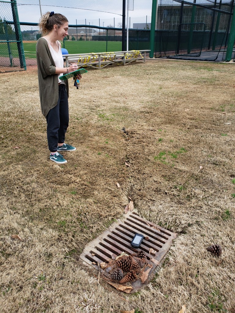 Cassidy collecting field data.